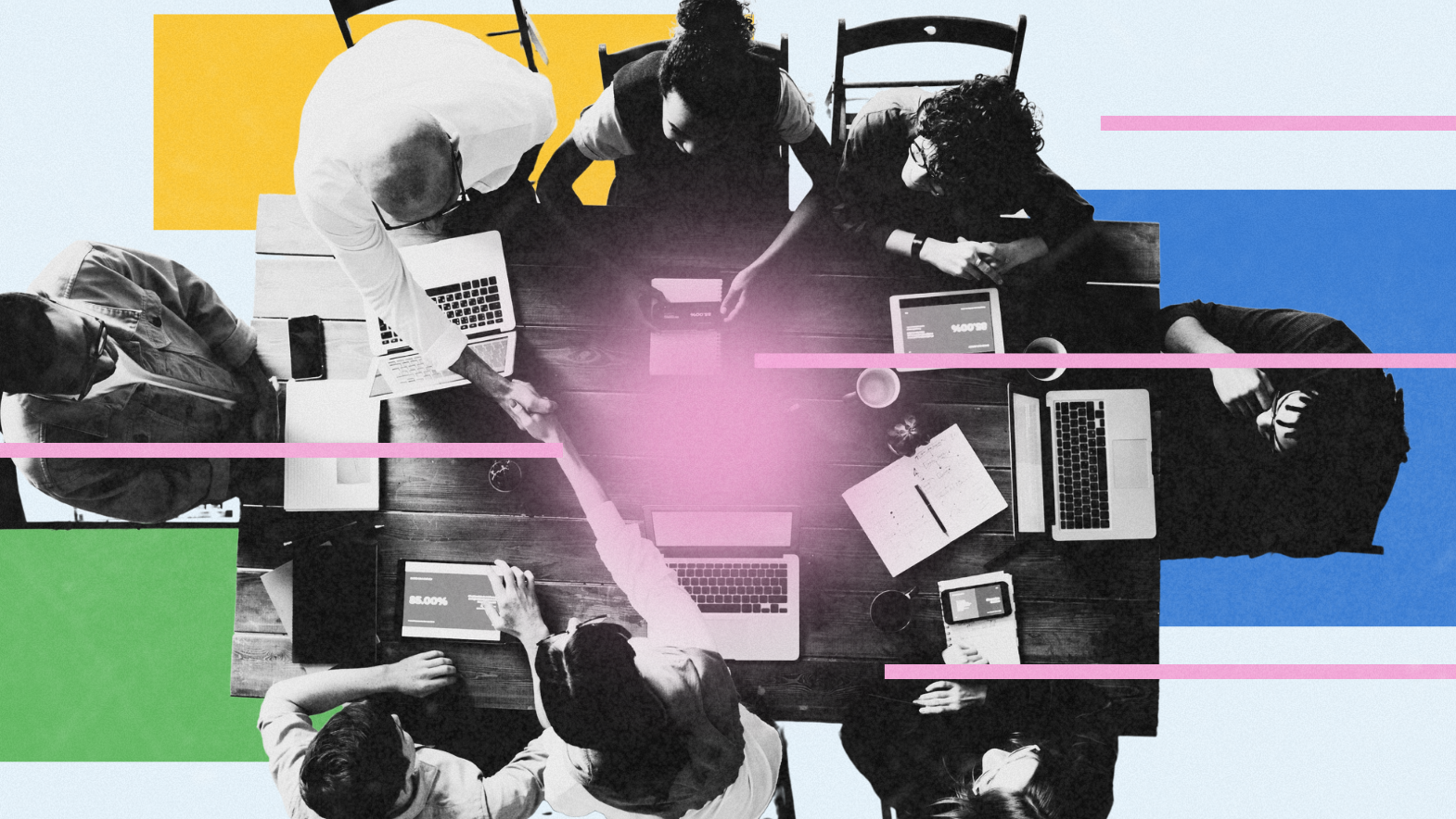A top-down view of a diverse group of people collaborating at a wooden table with laptops, tablets, and notebooks. Two individuals are shaking hands in the center. The image is overlaid with colorful geometric shapes in blue, yellow, green, and pink for a modern, creative aesthetic.