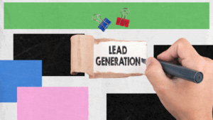 A hand writes LEAD GENERATION on a torn paper, highlighting the importance of lead generation, against a backdrop of colorful rectangles with blue and red binder clips at the top.