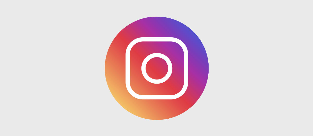 The Instagram logo featuring a white camera icon centered on a circular background with a gradient blend of pink, purple, orange, and yellow hues.