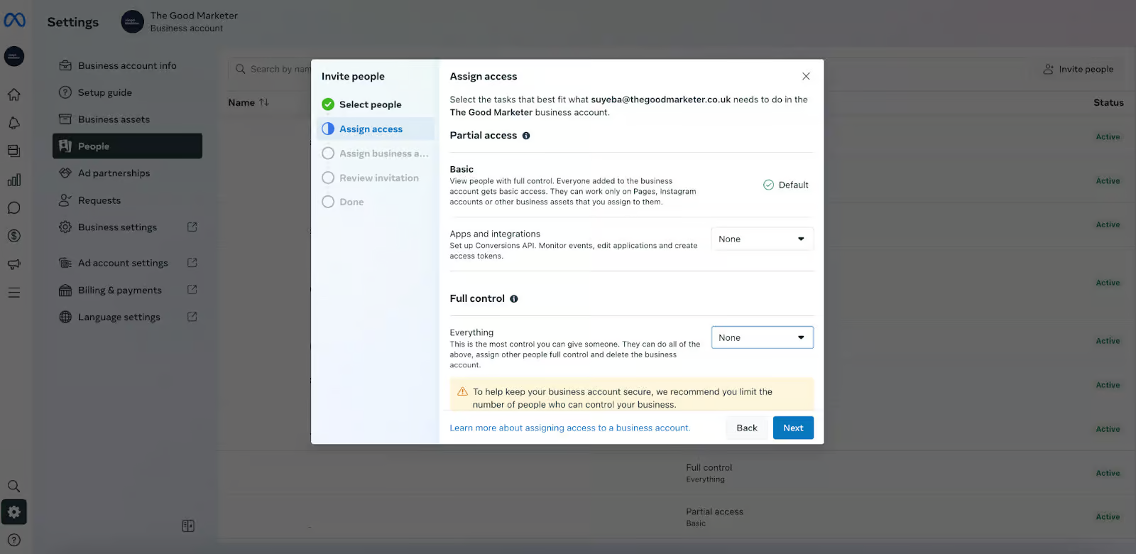 Screenshot of Facebook Business settings showing the assign access options for partial or full control of an account.