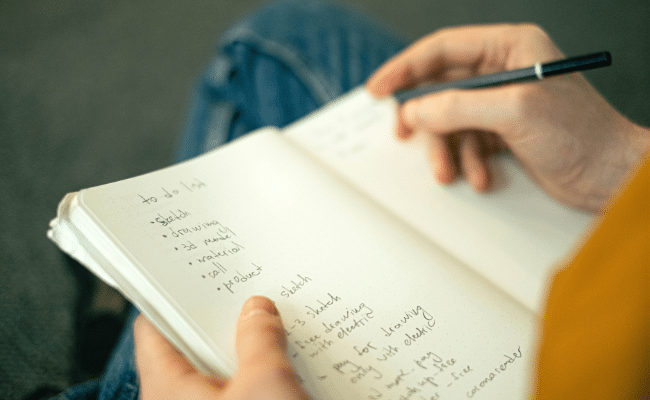 Writing in a notebook