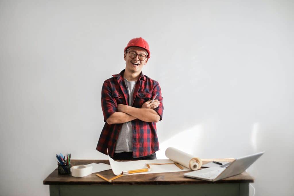 A man standing over projects