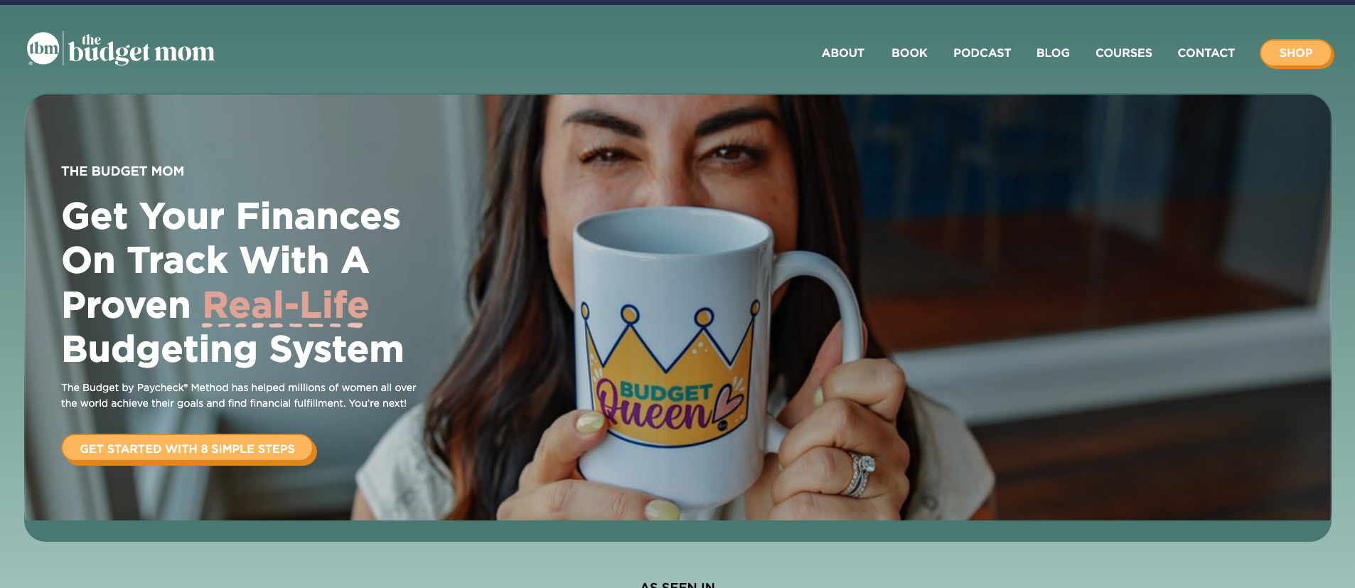 Homepage of The Budget Mom blog showing Kumiko Love holding a "Budget Queen" mug, promoting real-life savings tips and family finance strategies.
