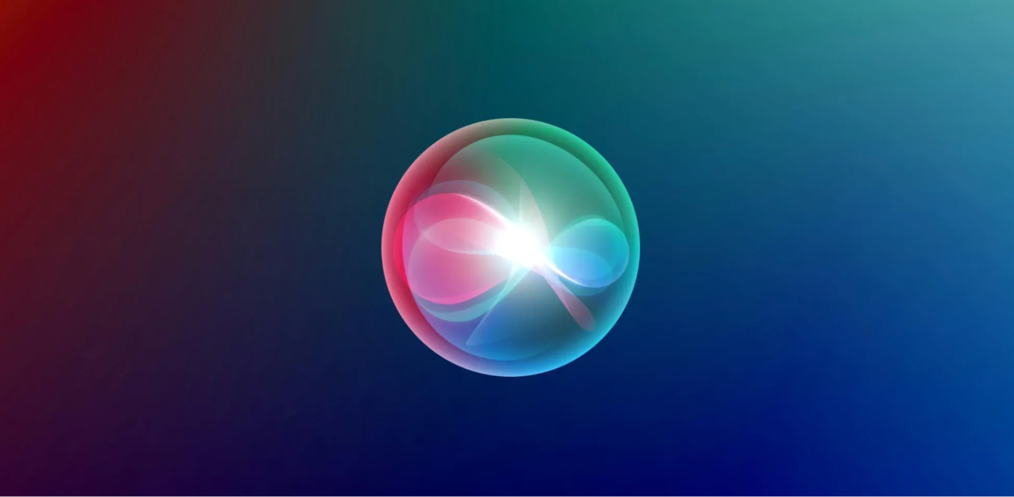 Colorful glowing Siri logo on a gradient background transitioning from red to blue, representing Apple’s virtual assistant interface.
