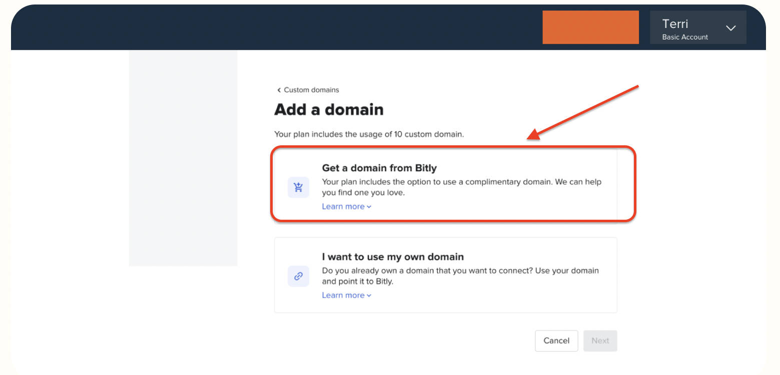 This screenshot displays the "Add a domain" section of a Bitly user interface under the "Custom domains" menu. The highlighted option allows users to get a domain from Bitly, with text explaining that the user's plan includes access to a complimentary domain. A red arrow and box draw attention to this feature, suggesting ease in selecting a custom vanity URL.