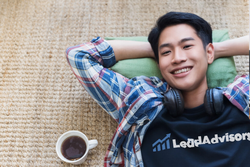 A LeadAdvisors team member taking a break in a comfortable recharge area, reflecting the company’s focus on employee wellness and work-life balance.