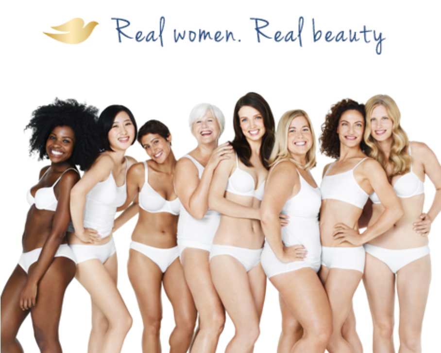 Group of diverse women in white underwear smiling together in Dove’s “Real Beauty” campaign promoting body confidence.