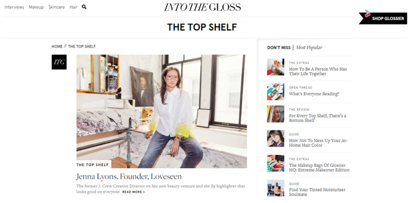 Screenshot of the "Into The Gloss" website featuring Jenna Lyons, Founder of Loveseen, in a Top Shelf article. The page includes a portrait of Jenna seated in a modern space, with side links to related beauty and lifestyle articles, and a banner to shop Glossier.