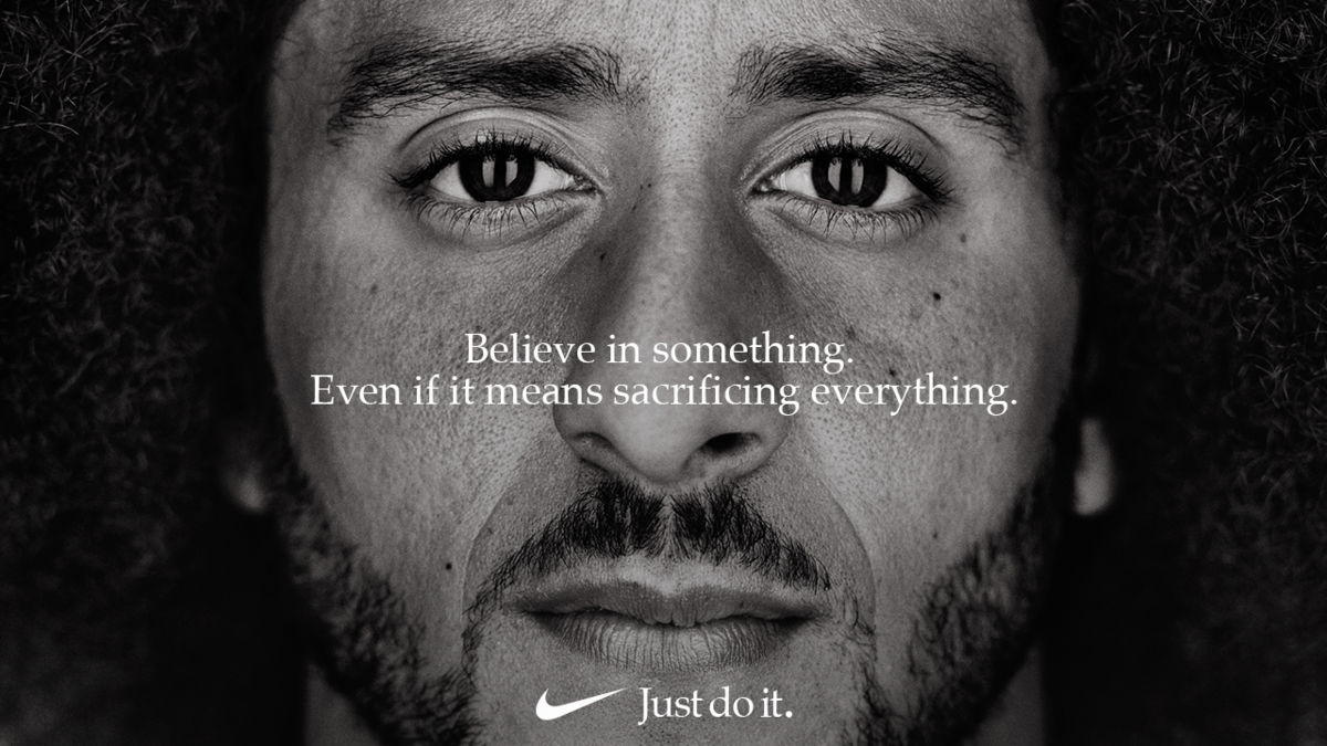 Close-up of Colin Kaepernick in Nike's "Just Do It" ad campaign with the slogan "Believe in something. Even if it means sacrificing everything."
