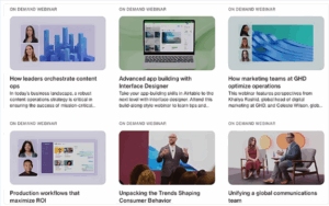 Grid of six on-demand webinar thumbnails featuring business and marketing topics such as content ops, app building, optimizing operations, production workflows, consumer behavior trends, and global team communication. Each tile includes a title, short description, and speaker images, presented in a clean, modern layout.