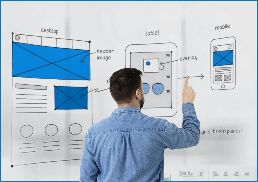 UX design team collaborating on wireframes and digital interfaces in a creative office environment.