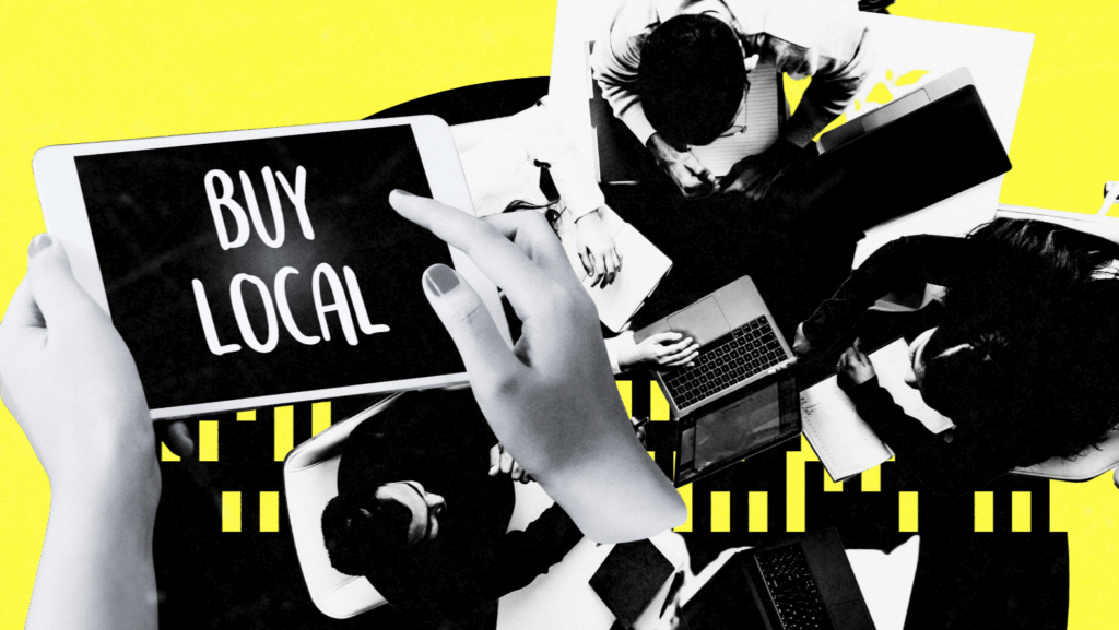 Stylized graphic showing hands holding a tablet with the words “Buy Local” and people working on laptops in the background.