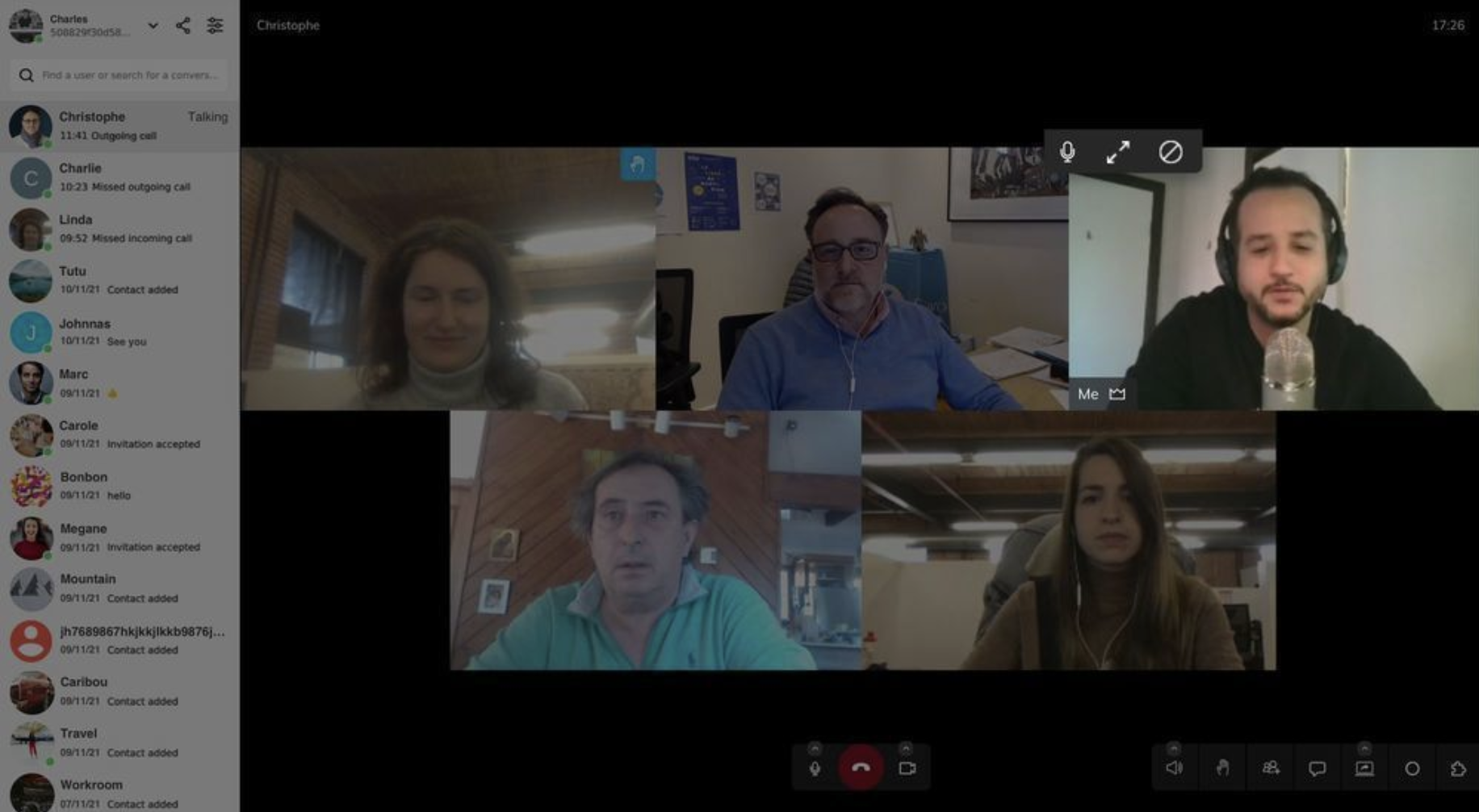 Two smartphone screens displaying a mobile group video chat app with multiple participants, reactions, and raised-hand notifications.