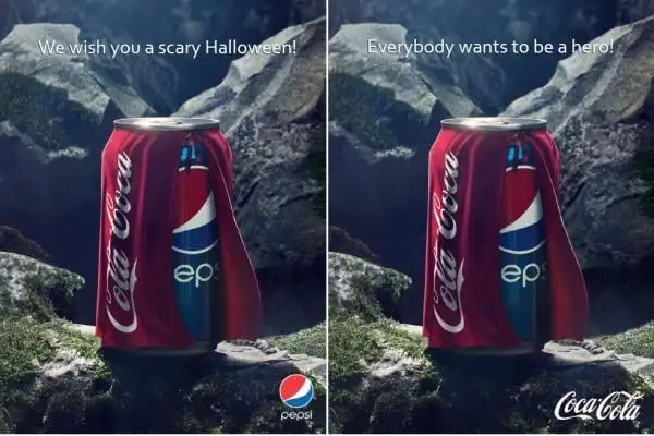 A Pepsi can wearing a Coca-Cola costume is shown in a playful Halloween-themed ad, contrasted with Coca-Cola’s version captioned “Everybody wants to be a hero.