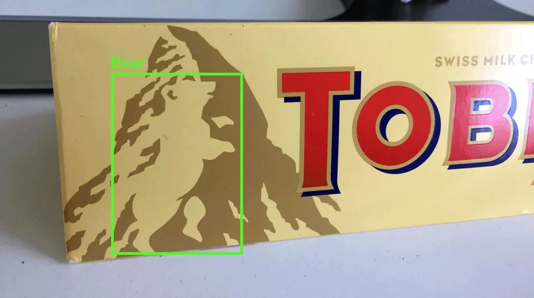 The Toblerone packaging reveals a hidden bear shape within the mountain illustration, symbolizing the brand’s Swiss origin from Bern.