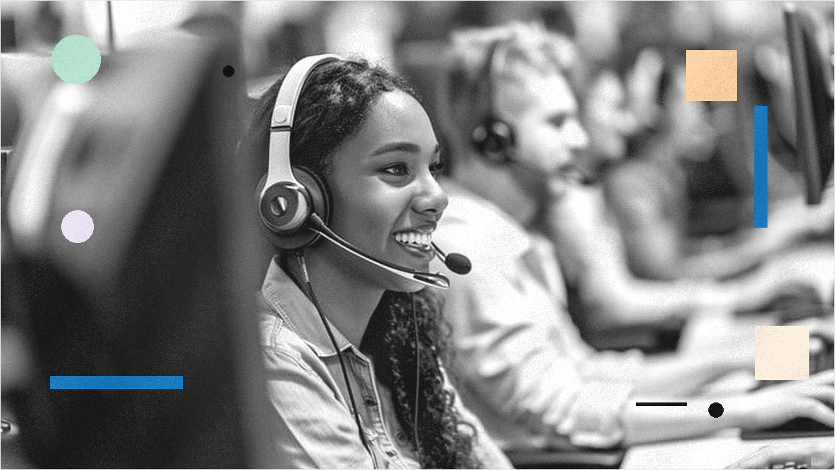 Smiling call center agent wearing a headset at a workstation, representing a live outbound team receiving ringless voicemail drop callbacks in a financial services operation.