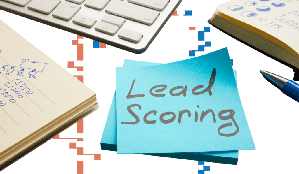 Lead scoring concept image with a sticky note labeled ‘Lead Scoring’ alongside notes and planning tools
