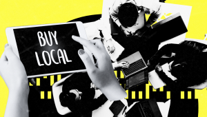 Stylized graphic showing hands holding a tablet with the words “Buy Local” and people working on laptops in the background.