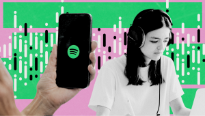 Visual of a person using Spotify on a phone and listening with headphones, illustrating Spotify’s audio experience.
